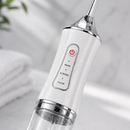 AquaDent™ – Irrigador Dental Portátil